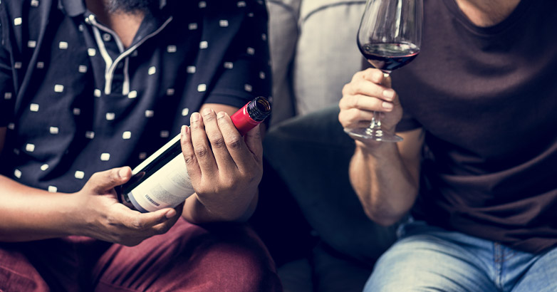 Two men tasting red wine in Long Island